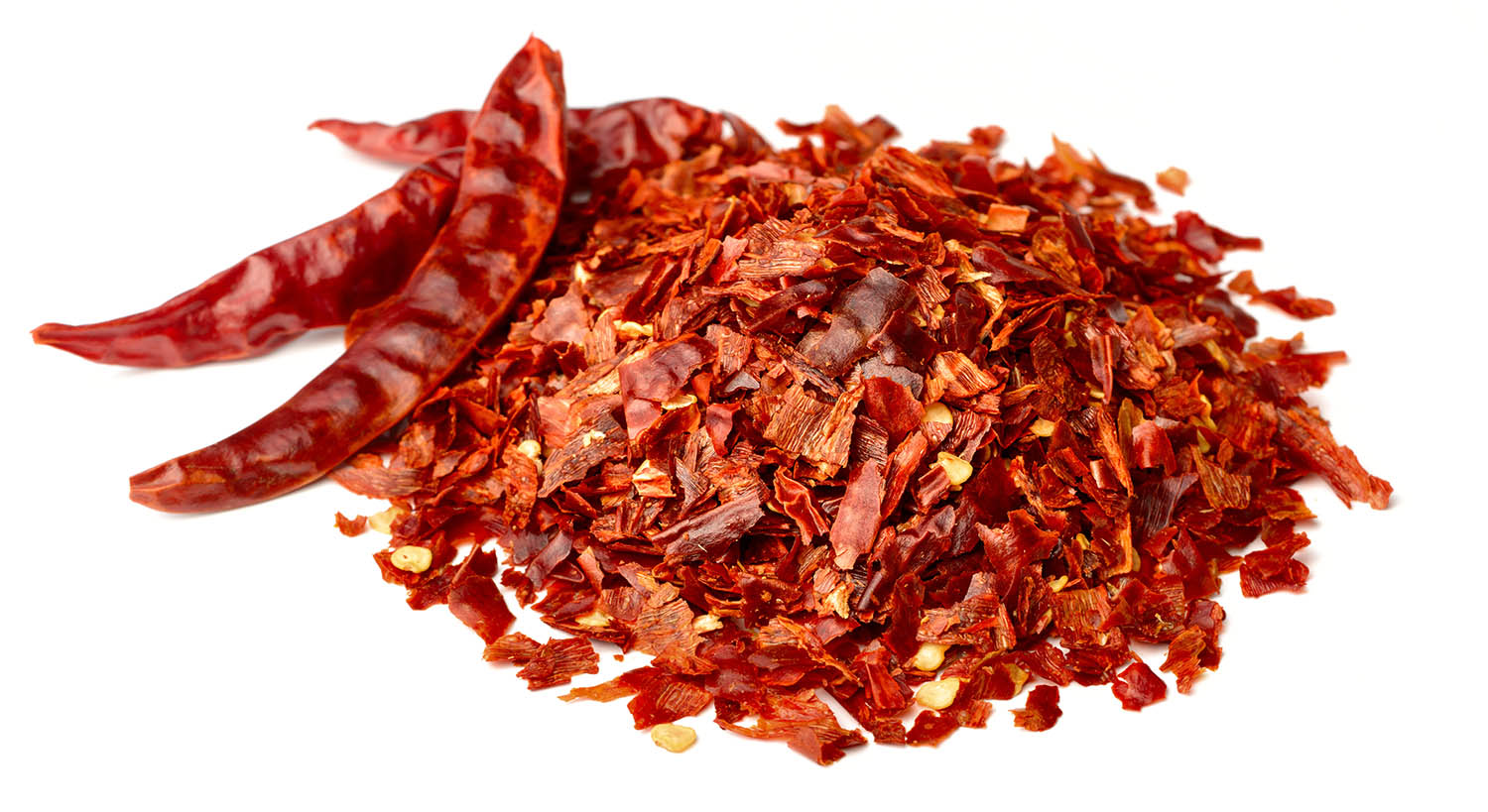 Dried Red Pepper Flakes Isolated On White